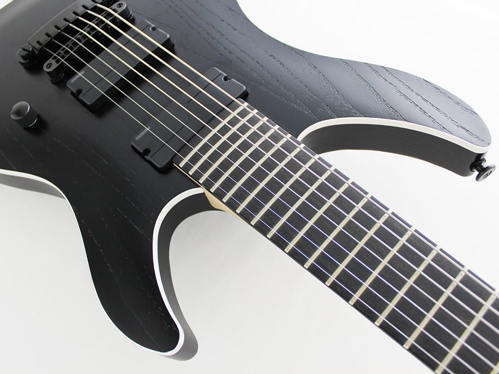 FGN MYTHIC JMY72ASHE SEVEN STRING IN OPEN PORE BLACK - Fouche Guitars